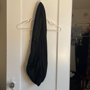 Black scarf with zip and button pocket. Excellent condition.
